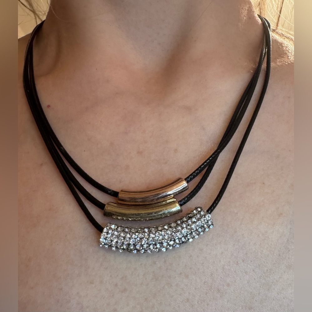 Elegant Black and Gold Necklace with Silver Accents